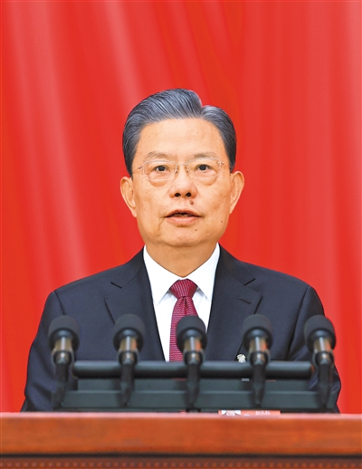 3月8日,十四届全国人大二次会议在北京人民大会堂举行第二次全体会议。受全国人大常委会委托,赵乐际委员长向大会报告全国人大常委会工作。 新华社记者 王 晔摄